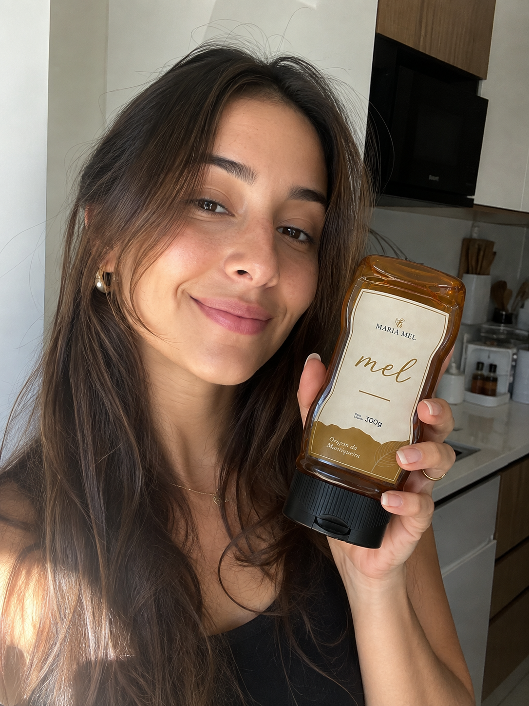 Cliente com produto Maria Mel